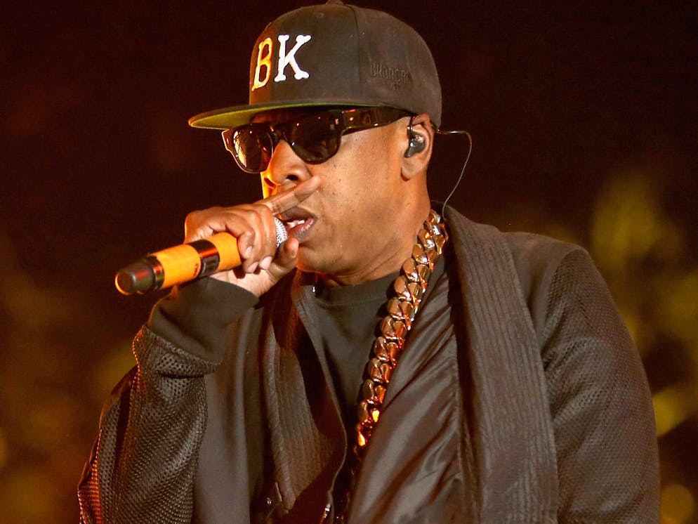 INDIO, CA - APRIL 12: Rapper Jay Z performs onstage during day 2 of the 2014 Coachella Valley Music & Arts Festival at the Empire Polo Club on April 12, 2014 in Indio, California.  (Photo by Christopher Polk/Getty Images for Coachella)