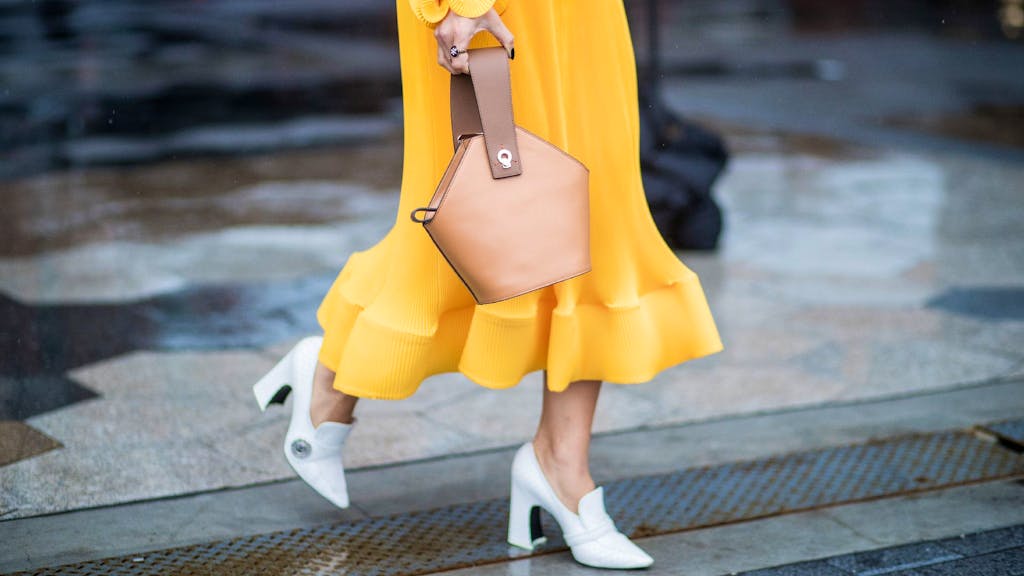 So tragen Sie Gelb. Frühlings-Trend: Die sonnige Farbe macht gute Laune
