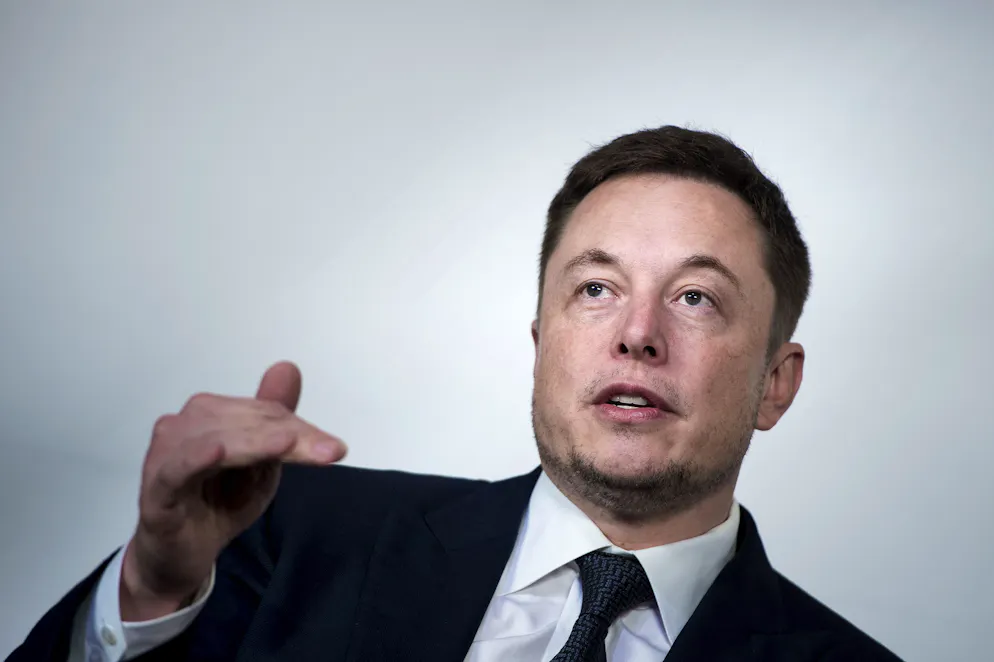 (FILES) In this file photo taken on July 19, 2017 Elon Musk, CEO of SpaceX and Tesla, speaks during the International Space Station Research and Development Conference at the Omni Shoreham Hotel in Washington, DC.
Tesla chief Elon Musk told employees May 14, 2018 the electric carmaker is being reorganized to speed up production of Model 3 vehicles -- a key to profitability at the fast-growing firm."To ensure that Tesla is well prepared for the future, we have been undertaking a thorough reorganization of our company," the memo obtained by AFP said."As part of the reorg, we are flattening the management structure to improve communication, combining functions where sensible and trimming activities that are not vital to the success of our mission."
 / AFP PHOTO / Brendan Smialowski