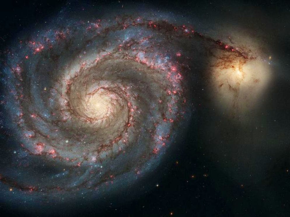 Die Whirlpool-Galaxie (M51a) und die Begleitgalaxie (M51b). Das Hubble-Weltraumteleskopbild stellt eine Verschmelzung zweier Galaxien dar, die in der Masse der Milchstrasse und der grossen Magellanschen Wolke ähneln. Foto: S. Beckwith/Hubble Heritage Team/ESA/NASA