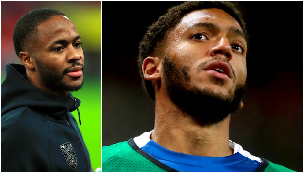 Raheem Sterling (l.) verteidigt seinen Teamkollegen Joe Gomez.