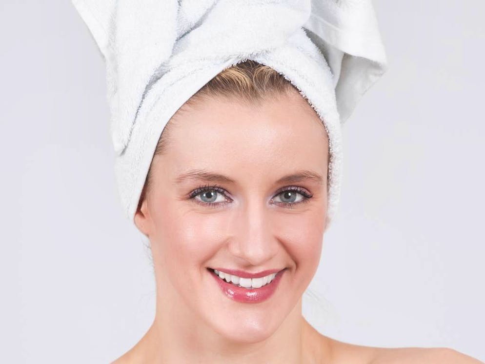 Beautiful woman after shower with white towel wrapped on her head.
When: 08 Nov 2010