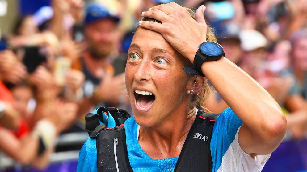 USA's Courtney Dauwalter reacts after winning the 170 km Mount Blanc Ultra Trail (UTMB) race around the Mont-Blanc crossing France, Italy and Swiss, on August 31, 2019 at the end of the race near Chamonix. (Photo by JEAN-PIERRE CLATOT / AFP) (Photo credit should read JEAN-PIERRE CLATOT/AFP via Getty Images)