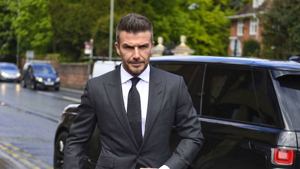 Football star David Beckham arrives at Bromley Magistrates Court for a hearing after he was spotted using his mobile phone while driving his Bentley, in London, Thursday, May 9, 2019. The magistrate has the power to impose six penalty points and a £200 fine for the charge of using a mobile while driving. (Victoria Jones/PA via AP)