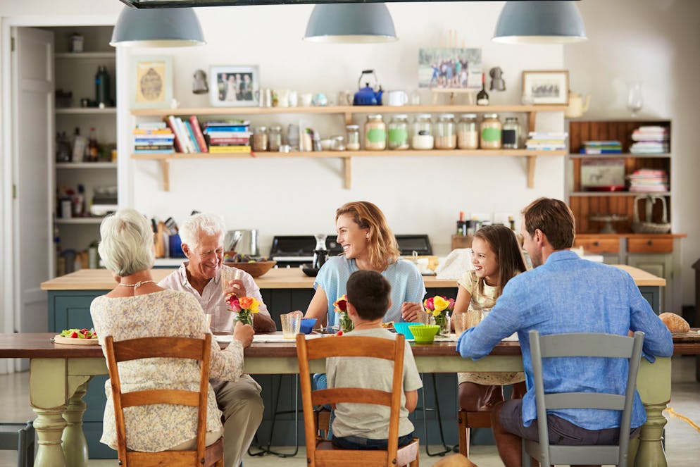 Three generation family eating in the kitchen at home; Shutterstock ID 1065552593; Purchase Order: ETX/Relaxnews/Fil; Client/Licensee: Arnaud POURPOINT