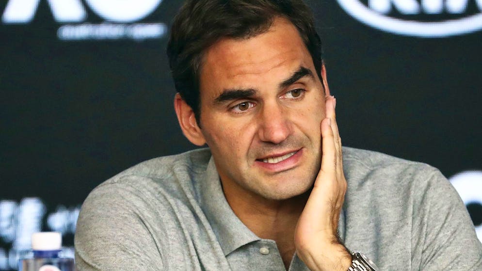 Switzerland's Roger Federer speaks during a press conference following his semifinal loss to Serbia's Novak Djokovic at the Australian Open tennis championship in Melbourne, Australia, Thursday, Jan. 30, 2020. (AP Photo/Dita Alangkara)