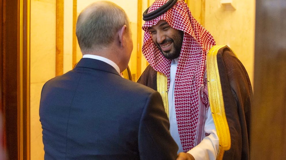 epa07920141 A handout photo made available by Saudi Royal Court shows Saudi Crown Prince Mohammad bin Salman (R) welcoming Russian President Vladimir Putin (L) at the Saudi Royal palace in Riyadh, Saudi Arabia, 14 October 2019. Russian President Vladimir Putin pays a state visit to Saudi Arabia. EPA/BANDAR ALJALOUD HANDOUT HANDOUT EDITORIAL USE ONLY/NO SALES