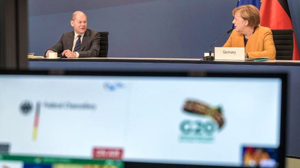 Kanzlerin Angela Merkel und Finanzminister nehmen aus dem Kanzleramt in Berlin am virtuellen G20-Gipfel teil.