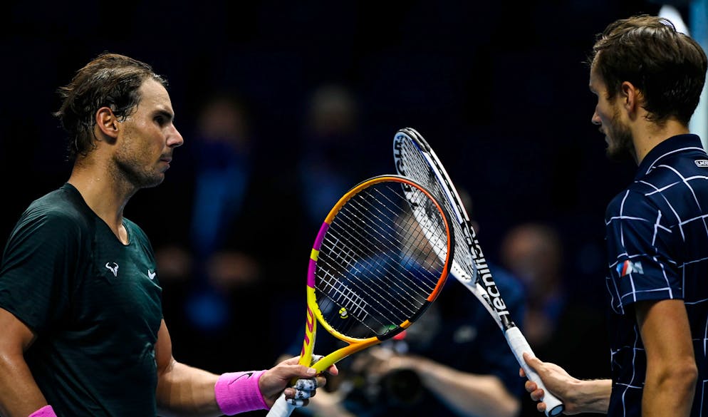LONDON, ENGLAND - NOVEMBER 21: Daniil Medvedev of Russia shakes hands with Rafael Nadal of Spain after beating him on Day 7 of the Nitto ATP World Tour Finals at The O2 Arena on November 21, 2020 in London, England. (Photo by TPN/Getty Images)