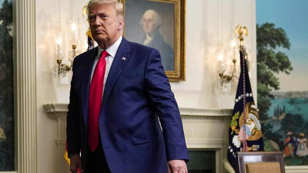 President Donald Trump departs after participating in a video teleconference call with members of the military on Thanksgiving, Thursday, Nov. 26, 2020, at the White House in Washington. (AP Photo/Patrick Semansky)