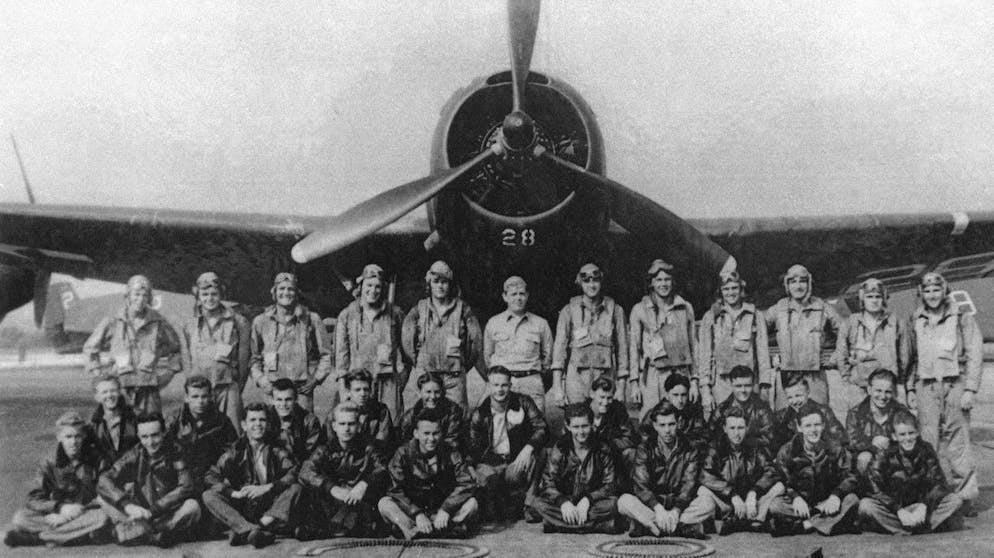 Torpedo Bomber #28, the lead plane of Flight 19, known as "Lost Squadron", which vanished Dec. 5, 1945, off the coast of Florida, is shown in this June 26, 1945, at Ft. Lauderdale Naval Air Station in Florida. The airmen shown in this photo are not those who vanished. The disappearance of Flight 19, a Navy mission that began the myth of the Bermuda Triangle, is still unexplained but not forgotten 60 years later. The 27 Navy airmen who disappeared somewhere off Florida's coast on Dec. 5, 1945, were honored in a House resolution Thursday. (AP Photo/HO)