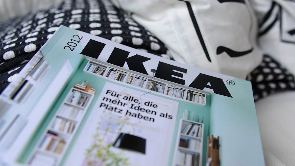 ARCHIVE - 18.08.2011, Hamburg: An IKEA catalog is in Hamburg when it is presented on an IKEA sofa.  After 70 years, furniture retailer Ikea will no longer have its printed catalog.  (to dpa 