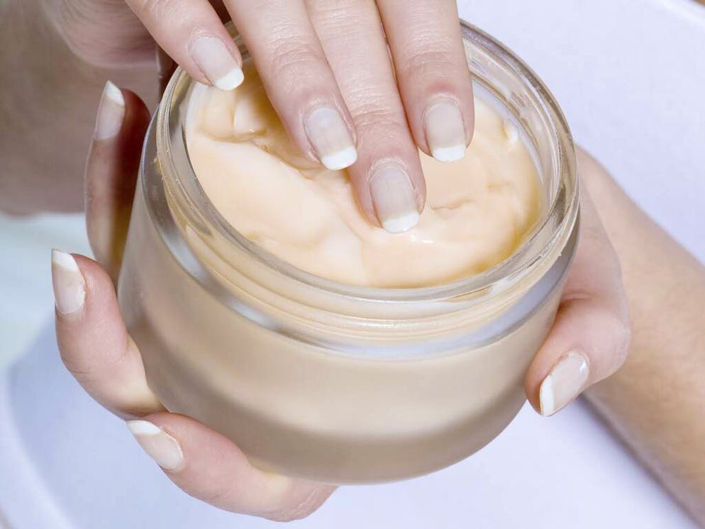 close up woman on studio isolated background applying mosturiser cream lotion bodycare
When: 10 Jan 2011