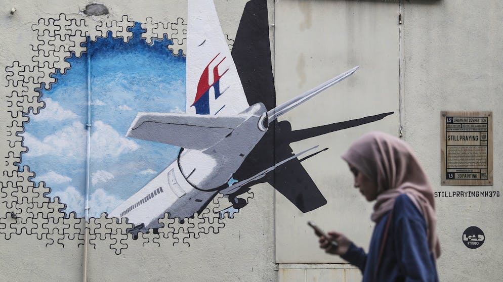 Die erfolglose Suche nach MH370. Auch dieses Wandgemälde in Kuala Lumpur erinnert an die Tragödie.