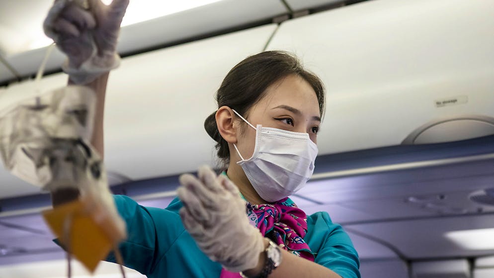 Nicht nur bei asiatischen Airlines, auch bei der Swiss sollen Masken schon bald zum Alltag gehören.