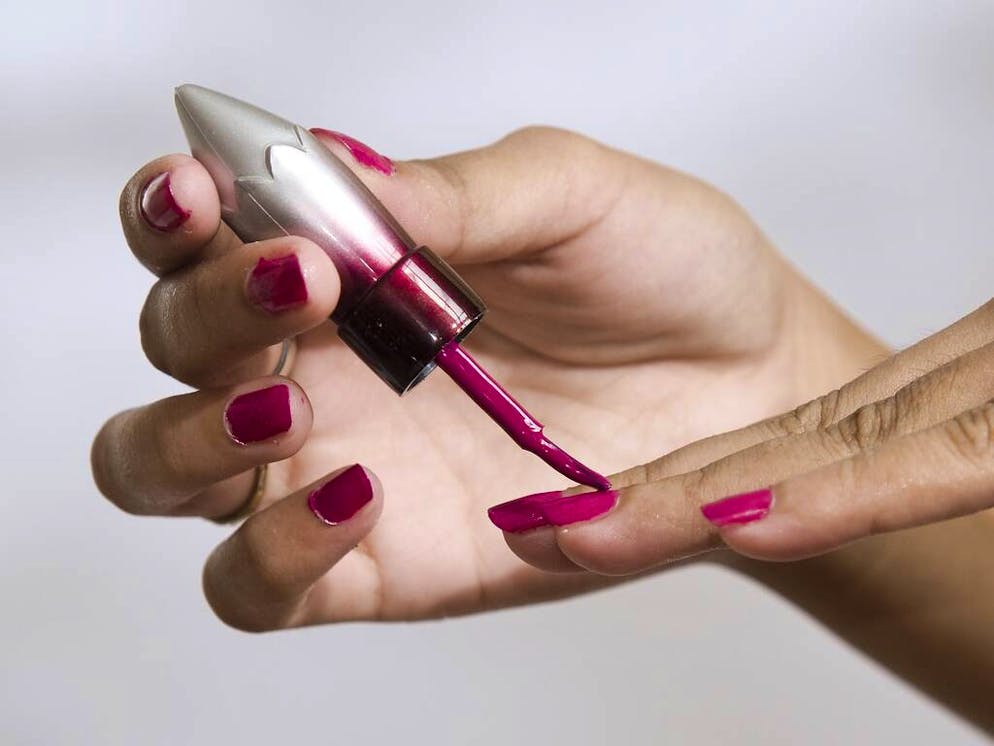 ModelÂ´s hand holding nail polish in studio setting

When: 30 Aug 2011