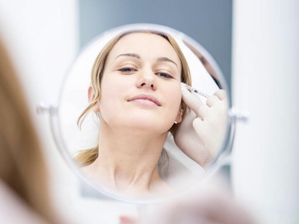 Aesthetic surgery, woman looking in mirror receiving injection

When: 25 Apr 2017
Credit: Fotoagentur WESTEND61/Westend61/Cover Images