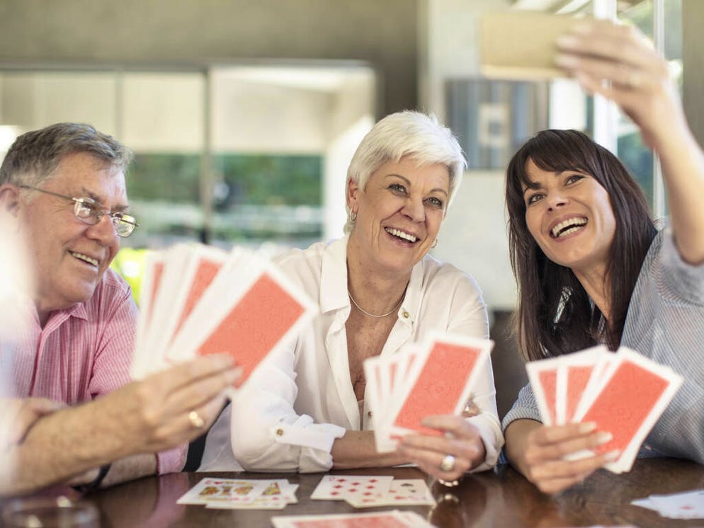 Happy senior couple playing cards and taking a selfie with daughter at home

When: 06 Nov 2017
Credit: zerocreatives/Westend61/Cover Images