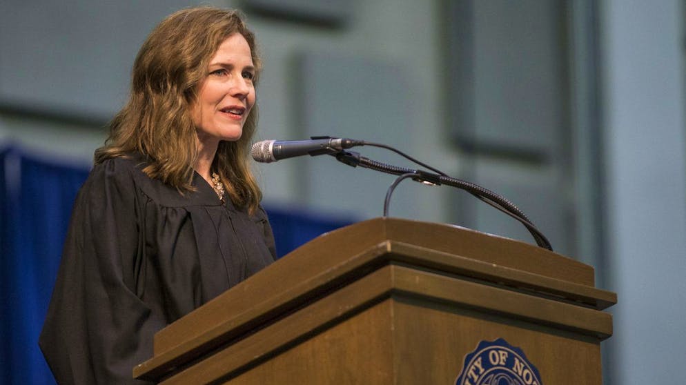 In this May 19, 2018, photo, Amy Coney Barrett, United States Court of Appeals for the Seventh Circuit judge, speaks during the University of Notre Dame's Law School commencement ceremony at the University of Notre Dame in South Bend, Ind. Barrett is on President Donald Trump's list of potential Supreme Court Justice candidates to fill the spot vacated by retiring Justice Anthony Kennedy. (Robert Franklin/South Bend Tribune via AP)