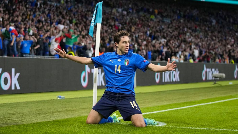 Italy's Federico Chiesa celebrates after scoring his side's opening goal during the Euro 2020 soccer semifinal match between Italy and Spain at Wembley stadium in London, Tuesday, July 6, 2021. (AP Photo/Frank Augstein, Pool)