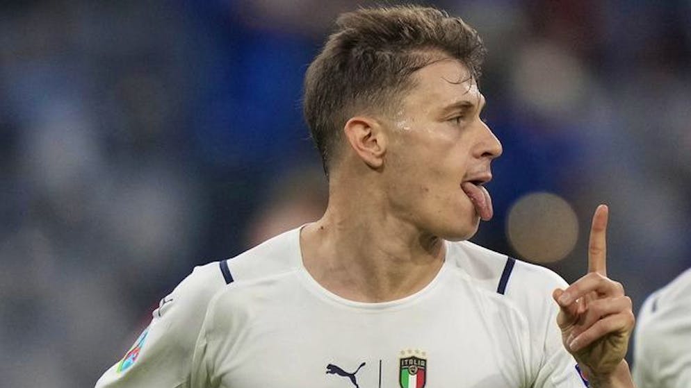 Italy's Nicolo Barella, left, and Italy's Marco Verratti celebrate scoring the opening goal during the Euro 2020 soccer championship quarterfinal match between Belgium and Italy at the Allianz Arena stadium in Munich, Germany, Friday, July 2, 2021. (AP Photo/Matthias Schrader, Pool)