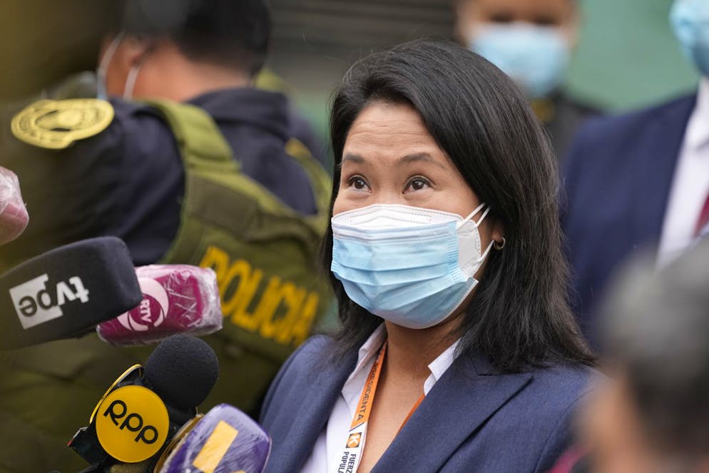 Presidential candidate Keiko Fujimori speaks to the media after leaving the court where a judge will decide if she should return to jail in connection with a money laundering case in Lima, Peru, Monday, June 21, 2021. The case comes amidst ongoing uncertainty surrounding the June 6 runoff presidential election between Fujimori and Pedro Castillo while election authorities are scrutinizing a small number of ballots amid unproven fraud claims. (AP Photo/Martin Mejia)