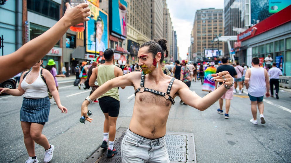 Amid Iravanipour dancing in the street at the Queer Liberation March on Sunday, June 27, 2021, in New York. (AP Photo/Brittainy Newman)