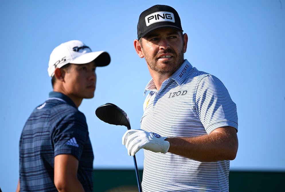 epa09351101 Louis Oosthuizen of South Africa (R) and Collin Morikawa of the U.S. (L) before teeing off on the ninth tee during the 3rd round of The Open 2021 golf championship at Royal St George's golf course in Sandwich, Kent, Britain, 17 July 2021. EPA/NEIL HALL