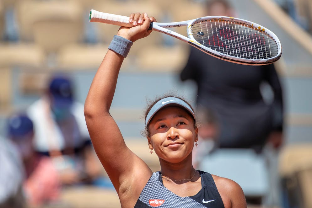 PARIS, FRANCE May 30. Naomi Osaka of Japan celebrates her victory after her match against Patricia Maria Tig of Romania in the first round of the Women's Singles competition on Court Philippe-Chatrier at the 2021 French Open Tennis Tournament at Roland Garros on May 30th 2021 in Paris, France. (Photo by Tim Clayton/Corbis via Getty Images)