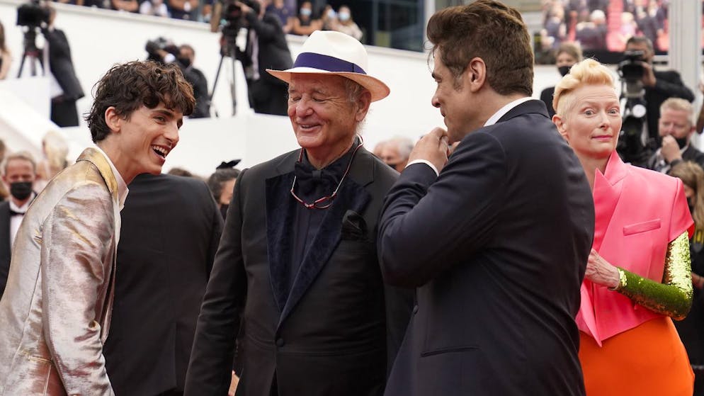 Timothee Chalamet, from left, Bill Murray, and Benicio Del Toro pose for photographers upon arrival at the premiere of the film 'The French Dispatch' at the 74th international film festival, Cannes, southern France, Monday, July 12, 2021. (AP Photo/Brynn Anderson)