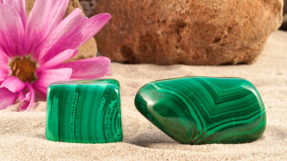 Photo collection of half-precious stones and gem stones. Here shown: Malachite.