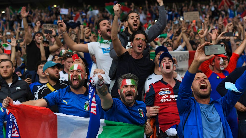 Italian fans cheers ahead of the Euro 2020 soccer final match between England and Italy at Wembley stadium in London, Sunday, July 11, 2021. (Andy Rain/Pool Photo via AP)