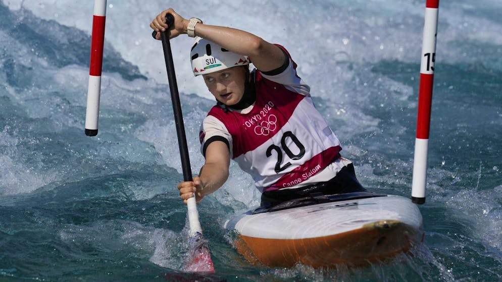 Alena Marx of Switzerland competes in the Women's C1 heats of the Canoe Slalom at the 2020 Summer Olympics, Wednesday, July 28, 2021, in Tokyo, Japan. (AP Photo/Kirsty Wigglesworth)