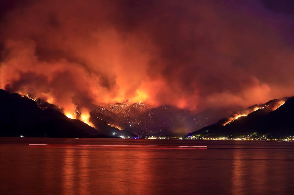 epa09379600 Smoke rises from a forest fire in Mugla's Marmaris district in Turkey, 29 July 2021 (issued 30 July 2021). The Turkish government's Disaster and Emergency Management Presidency (AFAD) said that at least 112 people were affected by the fires, including 58 who were hospitalised, mostly for smoke inhalation and burns. ...TURKEY OUT, USA OUT, UK OUT, CANADA OUT, FRANCE OUT, SWEDEN OUT, IRAQ OUT, JORDAN OUT, KUWAIT OUT, LEBANON OUT, OMAN OUT, QATAR OUT, SAUDI ARABIA OUT, SYRIA OUT, UAE OUT, YEMEN OUT, BAHRAIN OUT, EGYPT OUT, LIBYA OUT, ALGERIA OUT, MOROCCO OUT, TUNISIA OUT, AZERBAIJAN OUT, ALBANIA OUT, BOSNIA HERZEGOVINA OUT, BULGARIA OUT, KOSOVO OUT, CROATIA OUT, MACEDONIA OUT, MONTENEGRO OUT, SERBIA OUT EPA/MAHMUT SERDAR ALAKUS