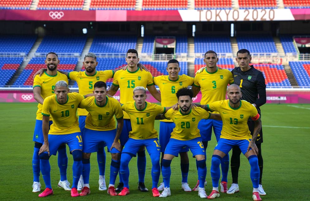Players of Brazil line up for a team photo before a men's soccer match against Ivory Coast at the 2020 Summer Olympics, Sunday, July 25, 2021, in Yokohama, Japan. (AP Photo/Kiichiro Sato)