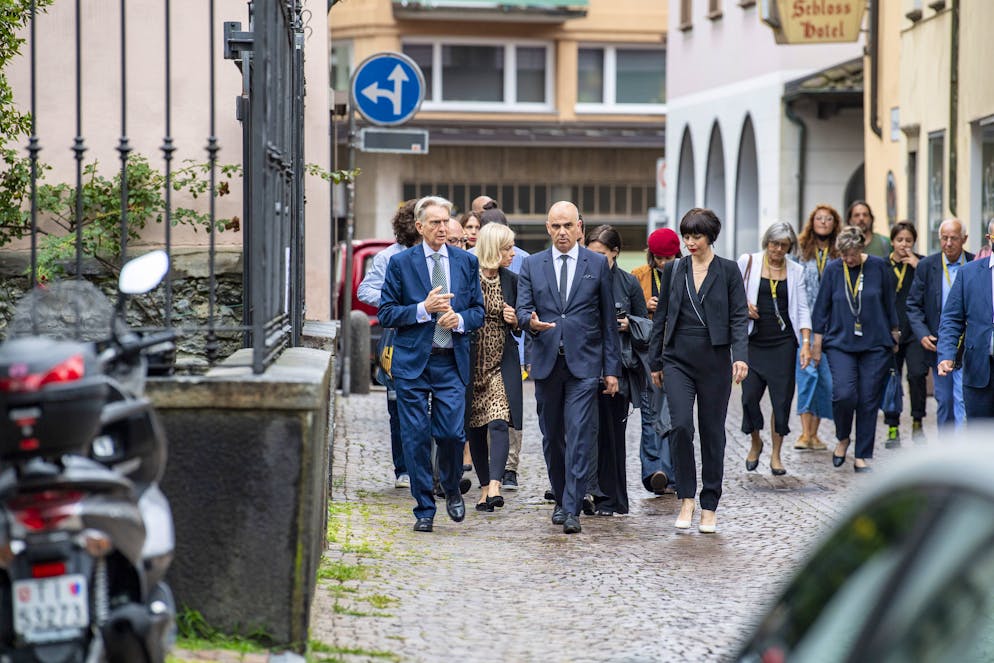 Swiss Federal Councillor Alain Berset, centre, his wife Muriel, reight, and the President of the Locarno Filmfestival Marco Solari, left, arrive for the official opening of the 74th Locarno International Film Festival in Locarno , Switzerland, Wednesday, August 4, 2021. The Festival del film Locarno runs from 4 to 14 August 21.(KEYSTONE/Urs Flueeler)