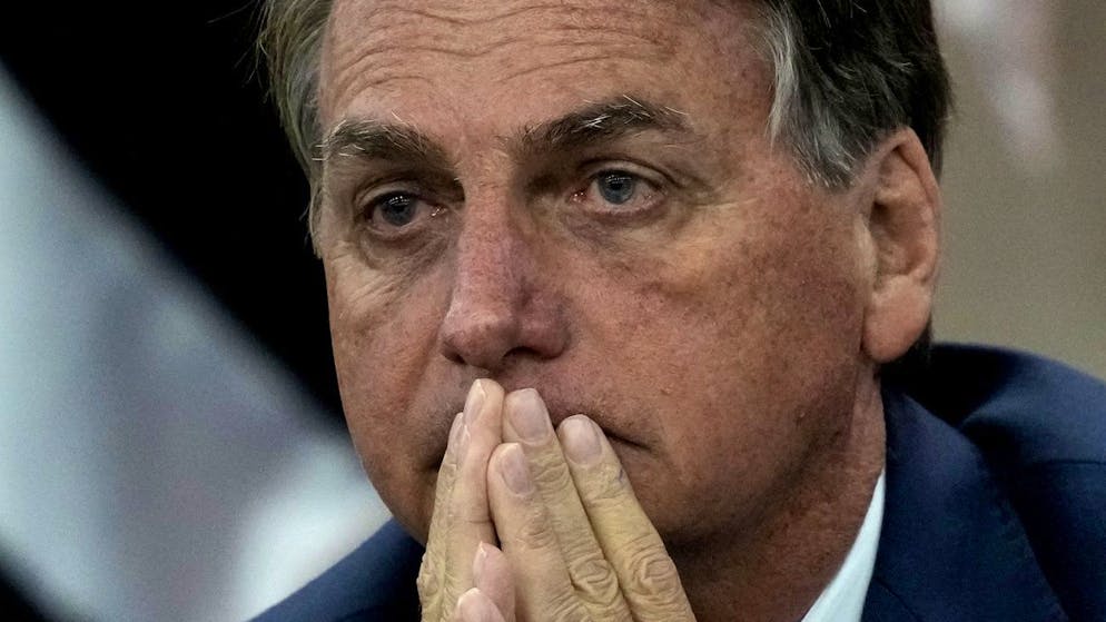 Brazil's President Jair Bolsonaro attends a ceremony at the Ministry of Citizenship, in Brasilia, Brazil, Monday, Aug. 2, 2021. Bolsonaro once again mentioned in his speech the existence of fraud in the Brazilian electoral system. The electoral court has rebuffed his claims as baseless, saying the system is trustworthy and there are several means of checking results. (AP Photo/Eraldo Peres)