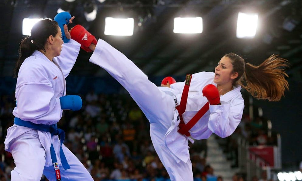 epa04799131 Elena Quirici (R) of Switzerland and Marina Rakovic (L) of Montenegro compete in the women's karate -68 kg category bronze medal bout during the Baku 2015 European Games in Baku, Azerbaijan, 14 June 2015. Rakovic won the bronze medal. (KEYSTONE/EPA/ZURAB KURTSIKIDZE)