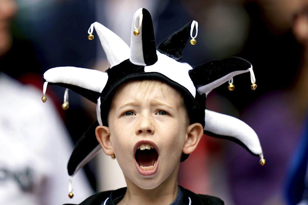 A young Derby County fan in the stands shows his support prior to the English Championship Play-off final soccer match between Derby and Aston Villa, at Wembley Stadium, London, Monday May 27, 2019. A place in the Premier League is up for grabs when Derby and Aston Villa meet at Wembley Stadium in the League Championship playoff final. It is the richest single game in world soccer, with the winner guaranteed a windfall of around $210 million in future income. (John Walton/PA via AP)