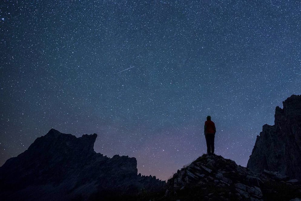 Stars and shooting stars are pictured during the annual perseids meteor shower, with the Drusenfluh mountain (2827 meter above sea level), left, and Sulzfluh mountain (2817 meters above sea level), on Thursday, August 13, 2015, in St. Antoenien in the canton of Grisons, Switzerland. (KEYSTONE/Gian Ehrenzeller)..Sterne und Sternschnuppen erhellen den Nachthimmel ueber der Drusenfluh (2827 Meter), links, und Sulzfluh (2817 Meter), waehrend dem jaehrlichen Meteorstrom der Perseiden, aufgenommen am Donnerstag, 13. August 2015, in St. Antoenien. (KEYSTONE/Gian Ehrenzeller)