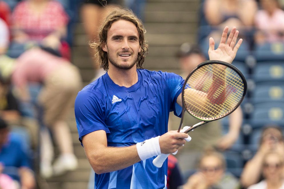 Stefanos Tsitsipas of Greece applauds the crowd after his 6-3 6-2 win over Russian Karen Khachanov at the men's National Bank Open tennis tournament in Toronto, Thursday, Aug. 12, 2021. (Chris Young/The Canadian Press via AP)