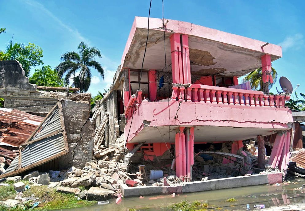 epa09414523 A view of the damage to buildings made by an earthquake, in Port-au-Prince, Haiti, 14 August 2021. A 7.2 magnitude earthquake left at least 304 dead, more than 1,800 people injured and caused considerable material damage, aggravating the already difficult situation of the impoverished Caribbean country. EPA/Duples Plymouth