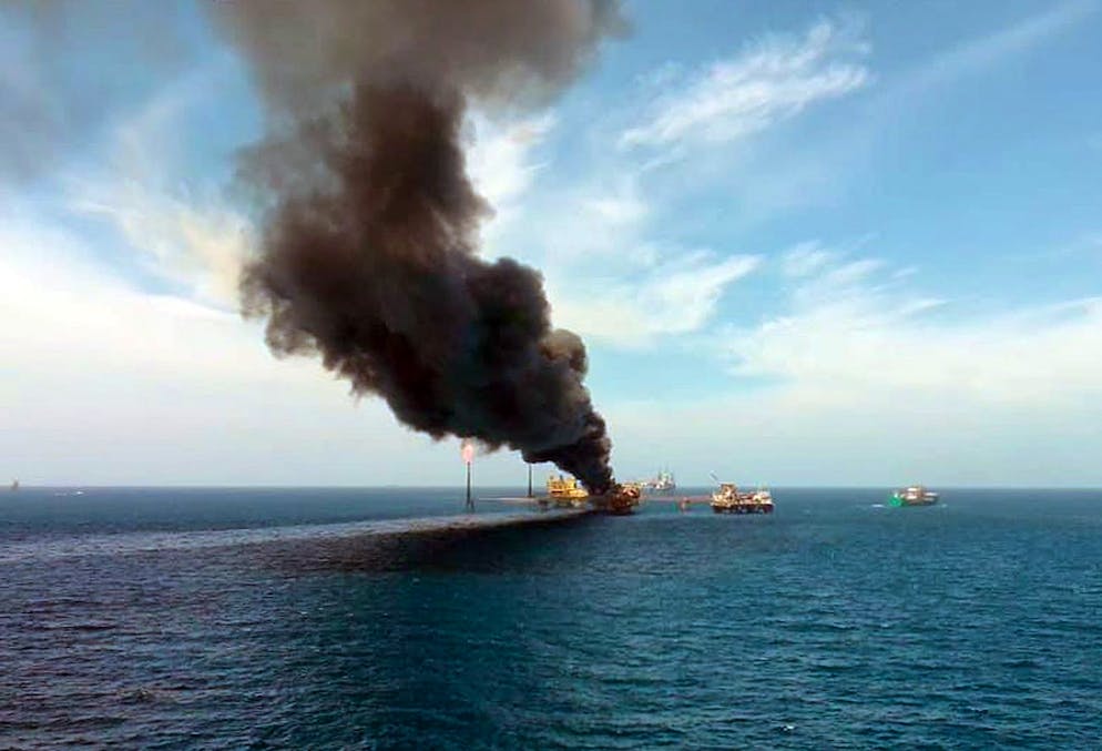 epa09425687 A view of the fire on an oil platform in Ciudad del Carmen, Campeche state, Mexico, 22 August 2021. At least five injured people were injured in a fire caused by an explosion on an oil platform off the coast of the state of Campeche, in the Gulf of Mexico, reported the state-owned company Petroleos Mexicanos (Pemex). EPA/Tribuna de Campeche MANDATORY CREDIT HANDOUT EDITORIAL USE ONLY/NO SALES