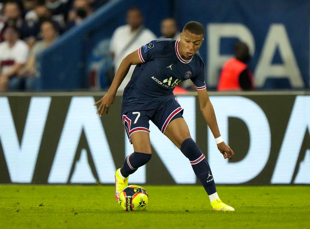 PSG's Kylian Mbappe controls the ball during the French League One soccer match between Paris Saint Germain and Strasbourg, at the Parc des Princes stadium in Paris, Saturday, Aug. 14, 2021. (AP Photo/Francois Mori)