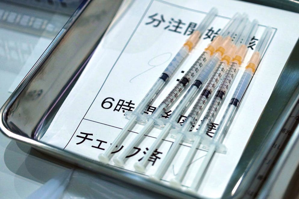 Syringes with the Moderna vaccine against COVID-19 disease for Tokyo Metropolitan Government employees at a newly opened vaccination center at the government building, Thursday, July 1, 2021, in Tokyo. This is part of the government efforts to ramp up vaccinations before the Tokyo 2020 Olympic Games begin. (AP Photo/Eugene Hoshiko)