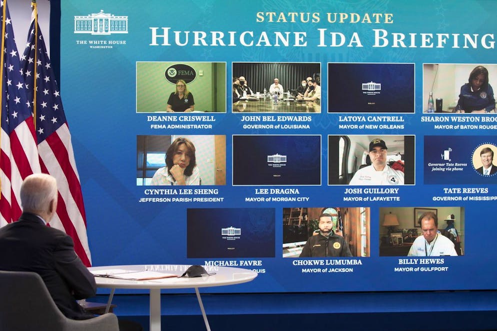 epa09437236 US President Joe Biden (L) partcipates in a virtual briefing on Hurricane Ida, with FEMA Administrator Deanne Criswell, mayors and governors of cities and states affected by the storm; in the South Court Auditorium of the Eisenhower Executive Officer Building (EEOB) on the White House complex, in Washington, DC, USA, 30 August 2021. EPA/MICHAEL REYNOLDS