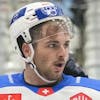 epa09434240 Marco Mueller (EV ZUG, R) reacts after scoring during the Champions Hockey League match SonderjyskE vs EV Zug in Vojens, Denmark, 28 August 2021. EPA/Claus Fisker DENMARK OUT