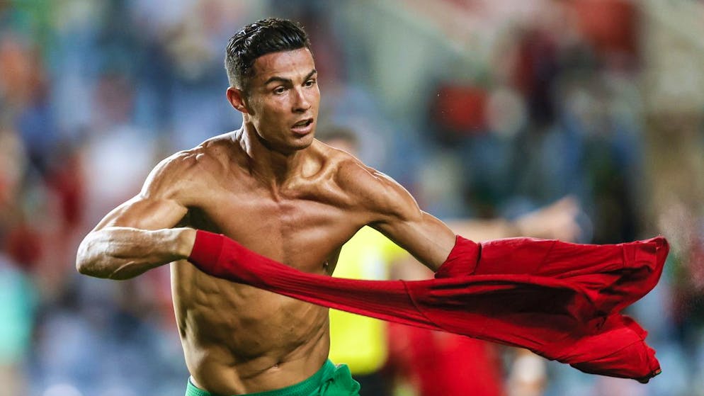 epa09441771 Cristiano Ronaldo of Portugal celebrates after scoring a goal during the FIFA World Cup Qatar 2022 group A qualification soccer match between Portugal and Ireland held at Algarve stadium in Faro, Portugal, 01 September 2021. EPA/ANTONIO COTRIM