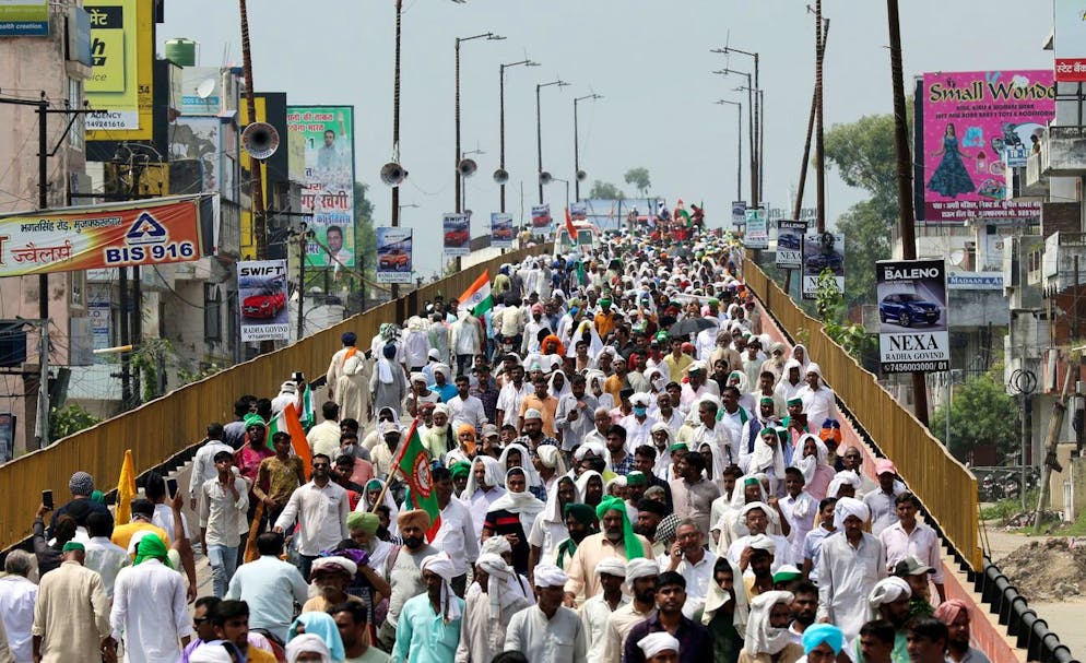 Les agriculteurs indiens et leurs partisans appartenant à divers syndicats d'agriculteurs assistent à un « Farmers Mahapanchayat » ou grand rassemblement d'agriculteurs à Muzaffarnagar, Uttar Pradesh, le 5 septembre 2021.
