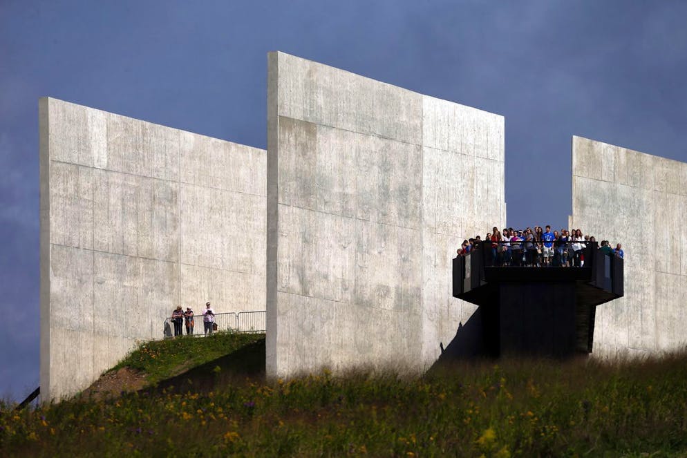 Visitors gather on the overlook at the Flight 93 National Memorial Visitors Center in Shanksville, Pa, Friday, Sept. 11, 2015, as the nation marks the 14th anniversary of the Sept. 11 attacks. (AP Photo/Gene J. Puskar)
